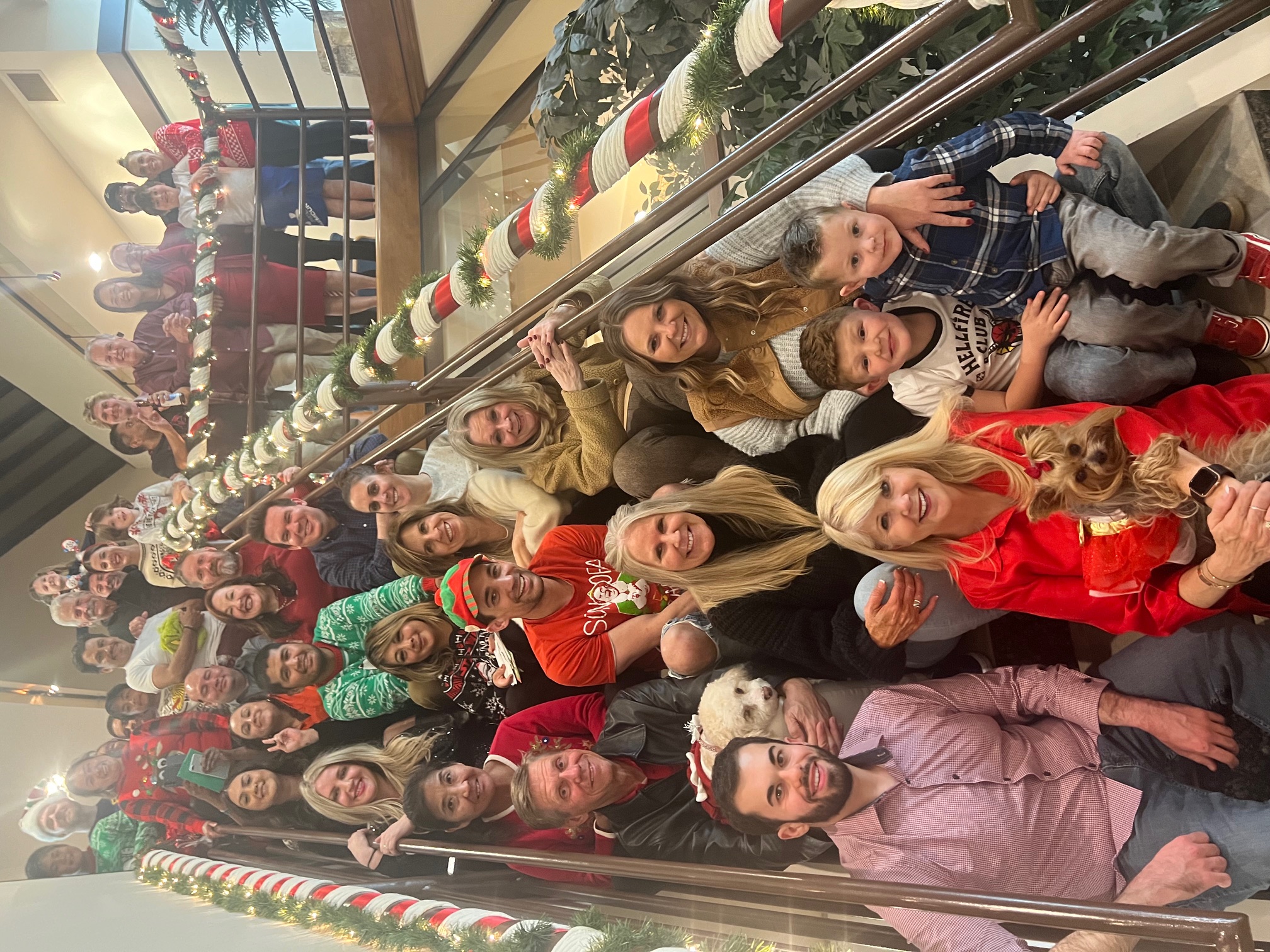 People sitting on stairs for holiday picture